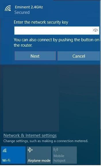 23 ENGLISH 5. If correct, Windows will now ask you to fill out your wireless security key. It also shows you to push the WPS button on the router. 6.