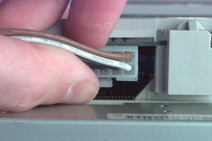 You will probably find it easiest to remove the cable from the CD-ROM drive at this time and remove it from the