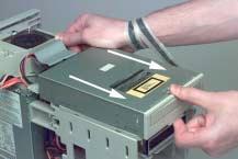 Removing Storage Peripherals You will be removing and reusing the CD-ROM drive, floppy disk drive, hard disk