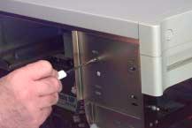 Test the fit by pressing the CD-ROM eject button on the front of the bezel.
