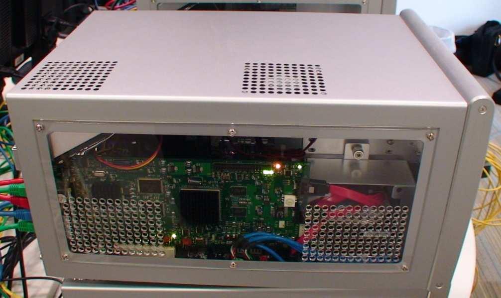 NetFPGA s Hardware Components Xilinx Virtex-2 Pro FPGA for User Logic Xilinx Spartan for PCI Host Interface Cypress: 2 * 2.