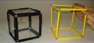 Geometro manipulatives used to form a cube around