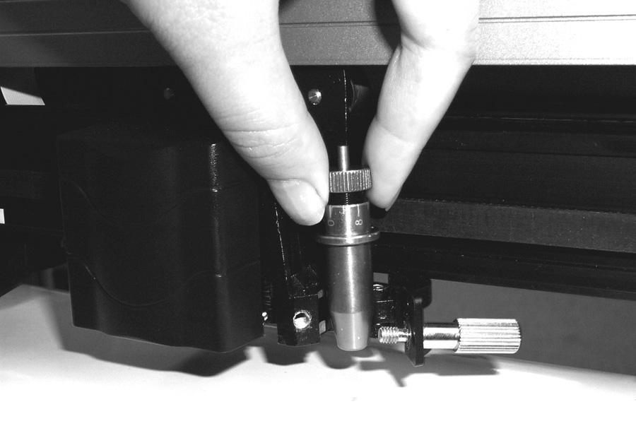 Step 4 Insert the blade holder into tool carriage.