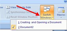 All open documents will be listed in the View Tab of the Ribbon when you click on Switch Windows. The current document has a checkmark beside the file name. Select another open document to view it.