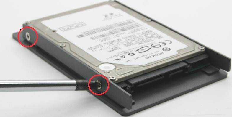 Find the HDD bracket come with the Pet-Door, M3 flat-head screws (4 pieces), and a HDD thermal pad in the accessory box.