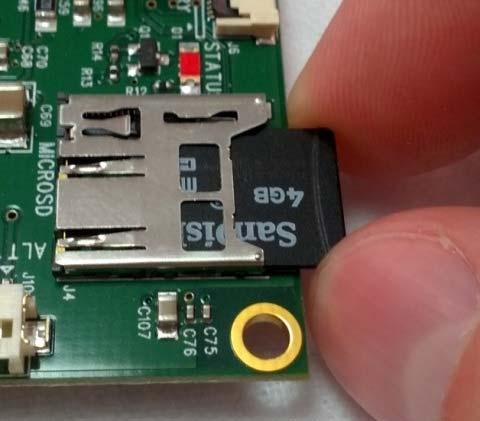 The microsd card is now fully removed from the socket. 2.