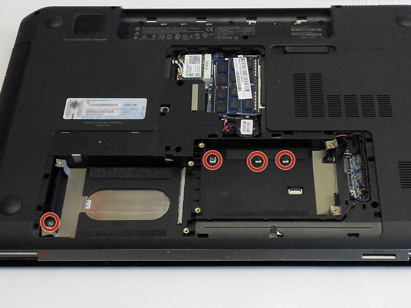 Step 6 Remove the screws from the hard drive compartments,