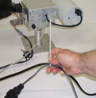 Leave several feet of slack and wire tie the cables to any solid object below the mounting bracket for strain relief.