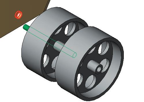 Use the to Area in the View toolbar to drag a zoom window around the rear axle hole and wheels, Fig. 22.