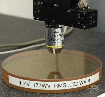The measurements were performed with a point source microscope attached to a coordinate measuring machine (CMM) arm, where surface points were collected by the CMM encoders as the microscope reached