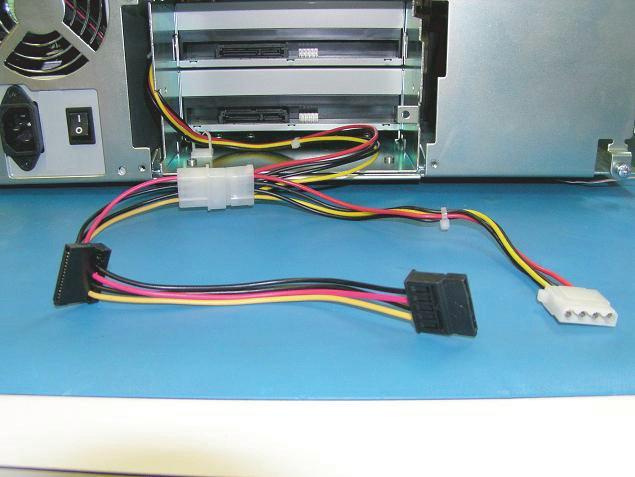 2. Unplug the SATA power converter cable from the optical drives.