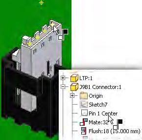 19. To add a mate assembly constraint to align the pins: Select the work point as shown.