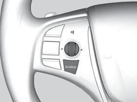 Steering Wheel Controls Operate certain functions of the audio system using the steering wheel controls. SOURCE button: Cycle through available audio Left selector wheel modes.