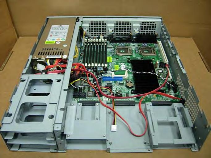 3.13 Remove motherboard PCBA from chassis using a