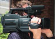 handle of the HVR-HD1000U camcorder contains a convenient record button and zoom control, essential for low position