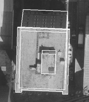 (a) An aerial view image (b) A ground view image Figure 1. Overlaid 3D building models in an aerial view and a calibrated ground view image. An overview of the proposed method is shown in Figure 2.