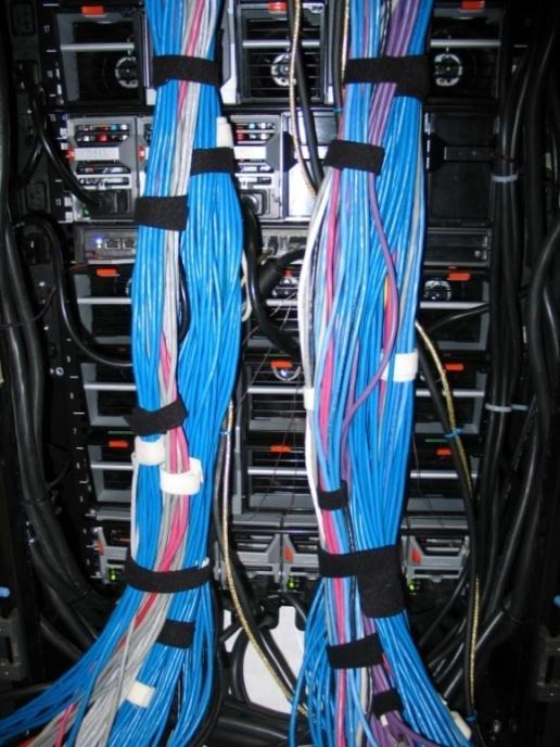 layout was designed to minimize cabling impact on airflow. In contrast, horizontally distributed fans can compromise airflow due to cable routing.