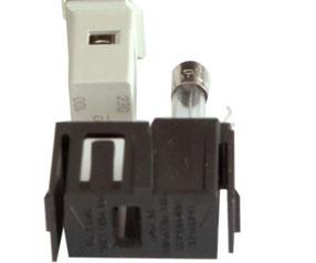The retainers are located on the right and left side of the holder and must be pressed towards the center. 3. Replace the defective fuses (R11) and press in the fuse holder until locked on both sides.