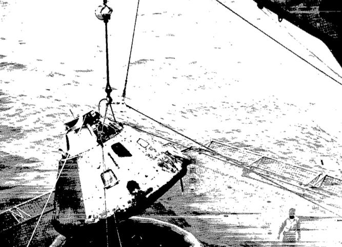 Figure 3.2 The Apollo 4 Command Module CM-017 being hoisted above its recovery ship, the U.S.S. Bennington [14]. The capsule is currently on display at NASA s Stennis Space Center in Bay St.