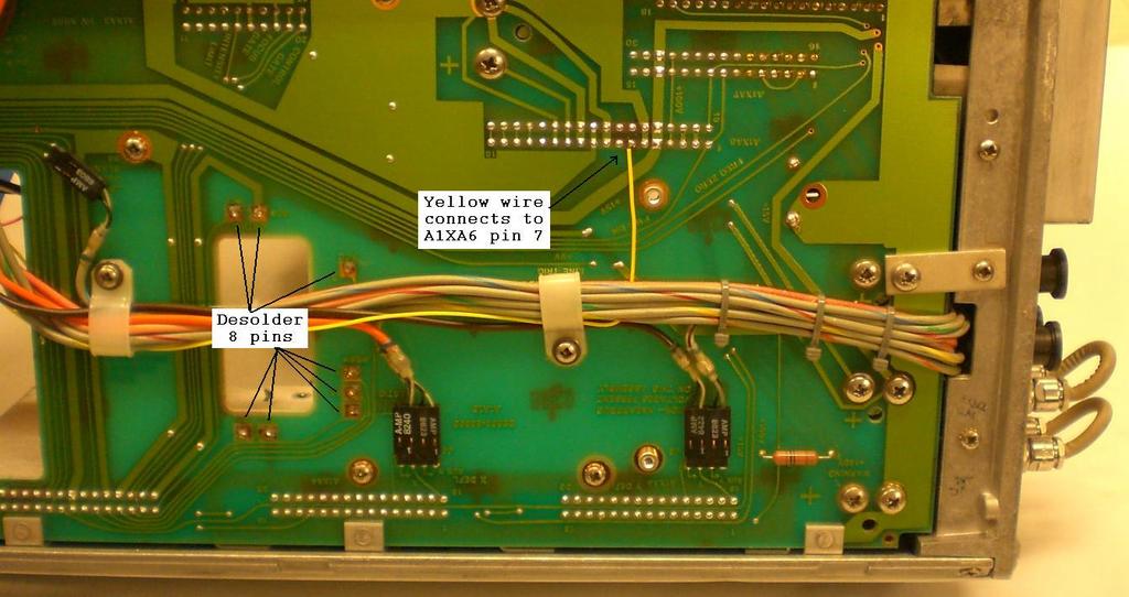 2-46 De-solder and discard the eight L-shaped pins that the CRT plugged into (figure 4) on the motherboard.