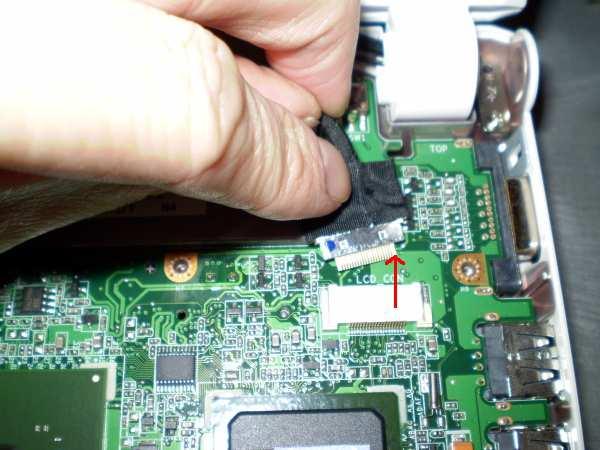 13. To remove the motherboard fully, first gently unplug the LCD connector on the