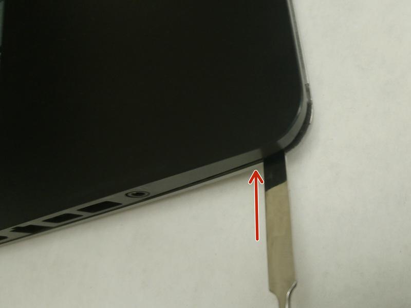 the touch-pad cable from the system board.