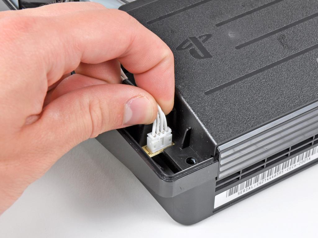 PlayStation 3 Slim PRAM Battery Replacement Step 7 Pull the DC-Out