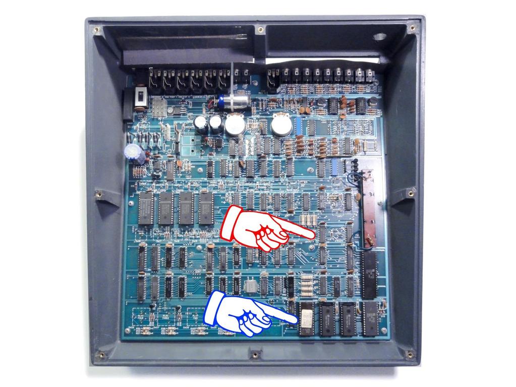 Opening the Drumulator: Figure 2 - Location of the 74LS00 chip and the OS chip 1. Unplug the Drumulator from the power outlet 2. Flip the Drumulator over 3.