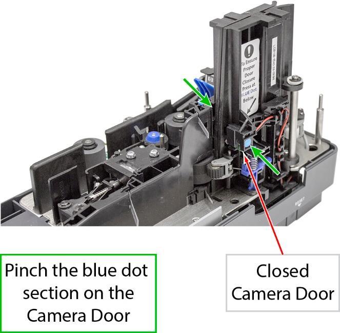 Closing the Camera Door Note: Verify that the Camera Door is locked or closed all of the way after opening or if experiencing document jams in this section of the scanner.