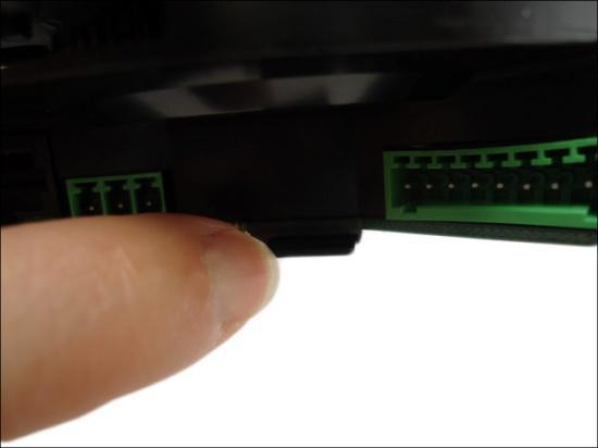 Insert a memory card into the card slot with the metallic contacts facing up the camera. 3. Push the card until it clicks into place.