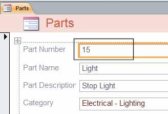 Select the Part Number field. We can easily move fields within a form. To try this, place the pointer in the middle of the highlighted field (i.e. the Part Number field), until the pointer changes to a (crosshair) pointer.