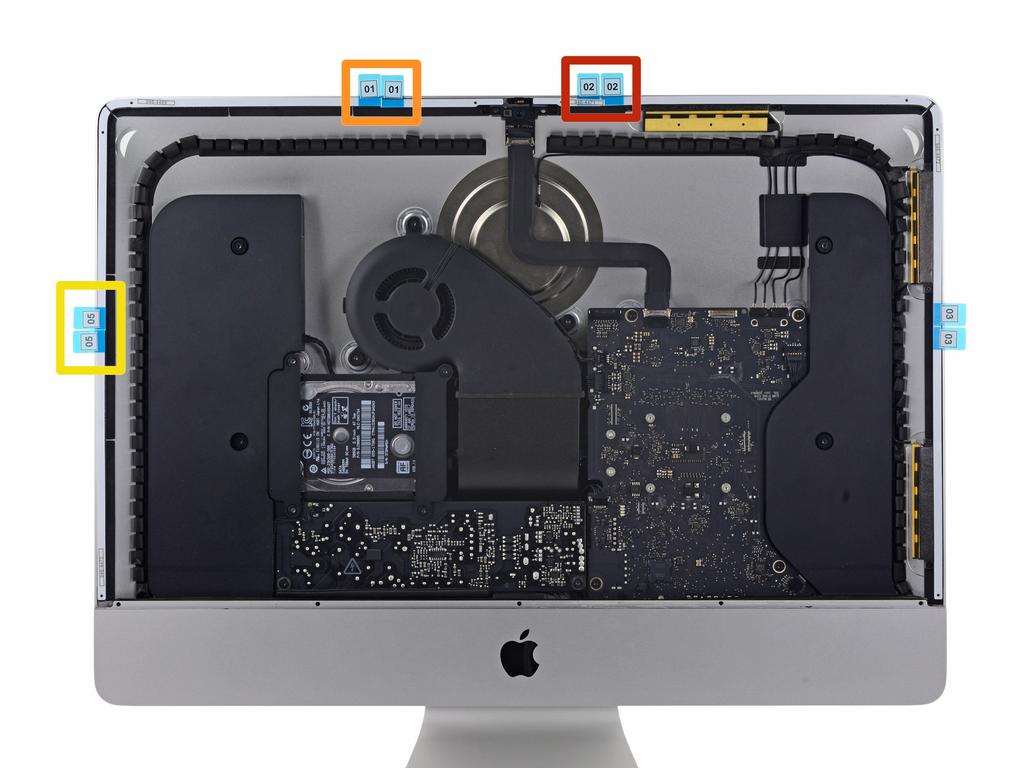 Étape 9 Work your way around the perimeter of the imac, adding three more adhesive strips in the same manner.