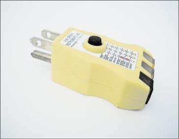 Figure 4-18 Use a receptacle tester to verify that hot, neutral, and