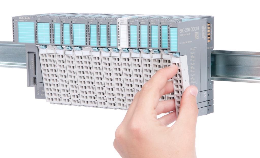 3.3. Installing and Removing Peripheral Modules 3.3.1. Installation Installing an assembled peripheral module Place the assembled module on the DIN rail by moving it straight towards the rail.