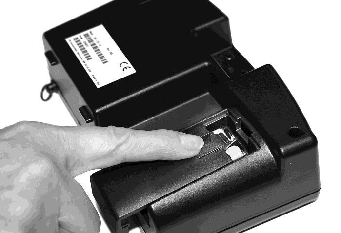 To select the type of batteries you are using: 1. Turn the unit off and locate the battery cover on the back of the micromanometer (see Figure 5). Figure 5: Battery Cover Removal 2.