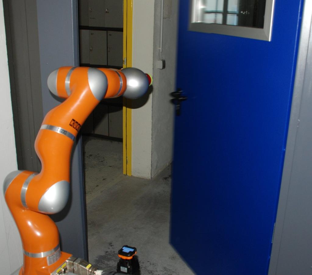 5.4. Experimental Evaluation 107 Figure 5.7: The DLR Light Weight Robot with custom end effector used in our experiments, opening the metal door. to avoid self-collision.