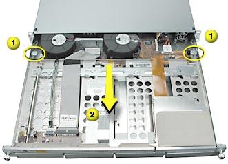 9. Grasp the thumbscrews and slide the bottom housing forward part way to expose the two chassis levers. (Figure 2) 10.