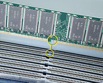 Installing the Replacement DIMM 1. Position the DIMM over the memory slot. (Figure 4) Note: The DIMM is designed to fit into the slot only one way.