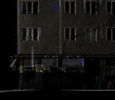 Figure 6 (left) - Color Points on the building Figure 7 (right) - Seamline inserted to remove the traffic signal and pole from the building colorization TerraMatch The correction algorithms in