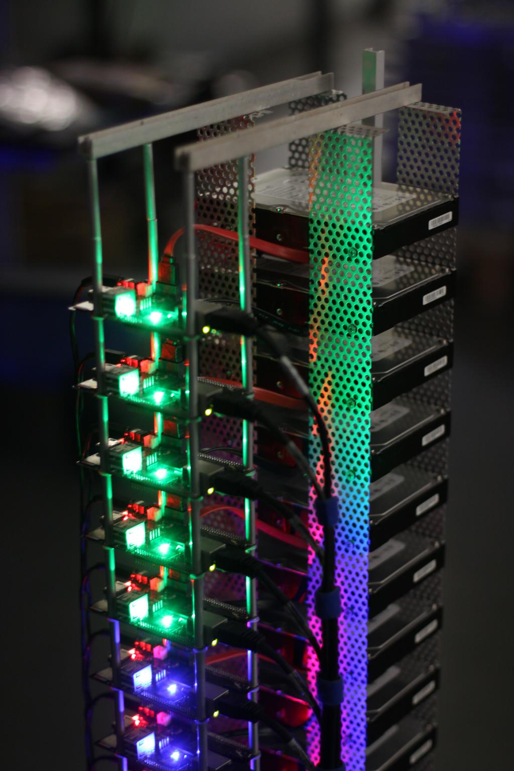 21st International Conference on Computing in High Energy and Nuclear Physics (CHEP2015) IOP Publishing Figure 1. Picture of the Cubieboard cluster Figure 2.
