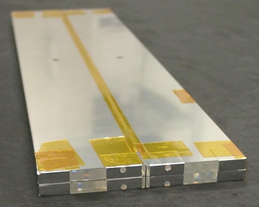 Time-of-Flight System TOF module Bicron BC-408 scintillator bar 6 x 50 x 395 mm3 (λ = 430 nm) two modules at top and two at bottom scintillator bars optically separated with reflective aluminized