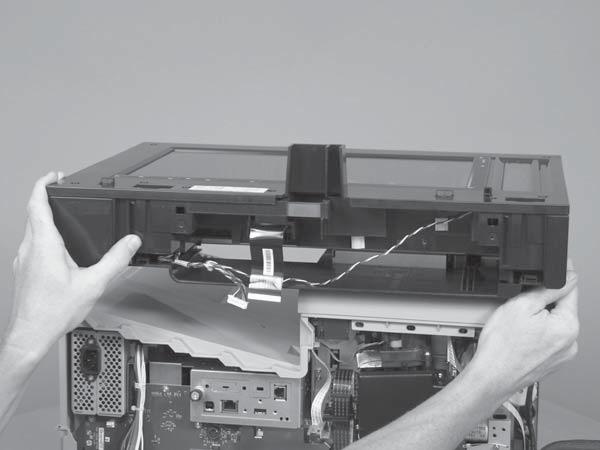 Move the scanner assembly toward the left side of the