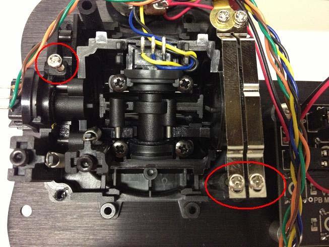 Enabling the throttle feature. The left screw has to be tightened down to enable the throttle/click feature.