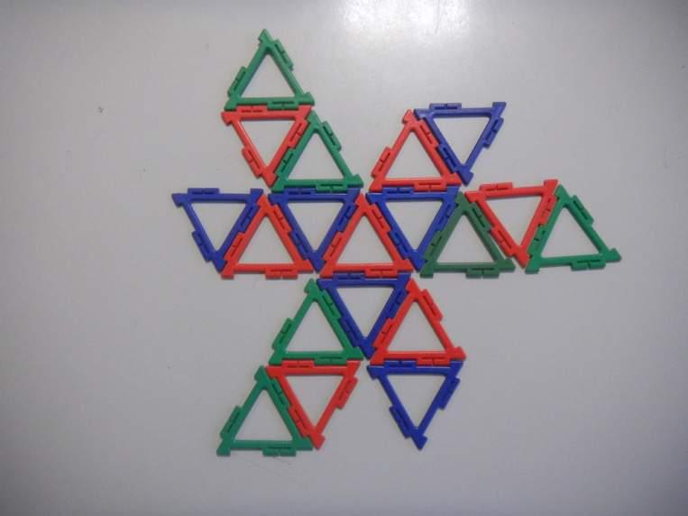 The white arrows show the vertices which become one when the net is closed.