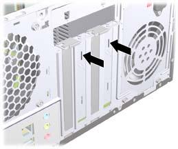 4. On the rear of the computer, a slot cover lock secures the expansion card brackets in place.