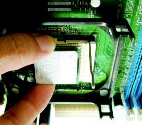 Carefully insert the CPU into the socket until it fits in place. The CPU fits only in one correct orientation.