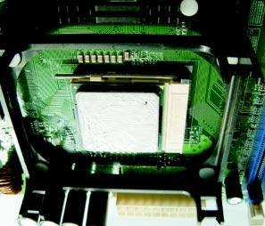 When the CPU is in place, press it firmly on the socket while you push down the socket lever to secure the CPU.