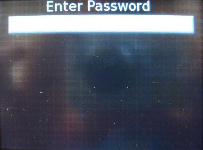 After some time with the device configuring you should see a screen (pictured left) asking for a password.