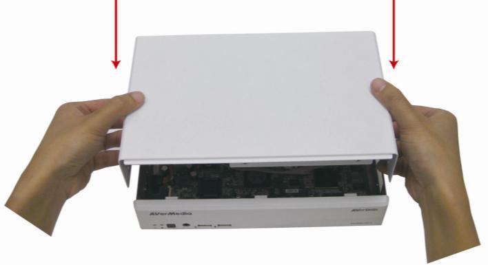 Hold the cover parallel with DVR unit