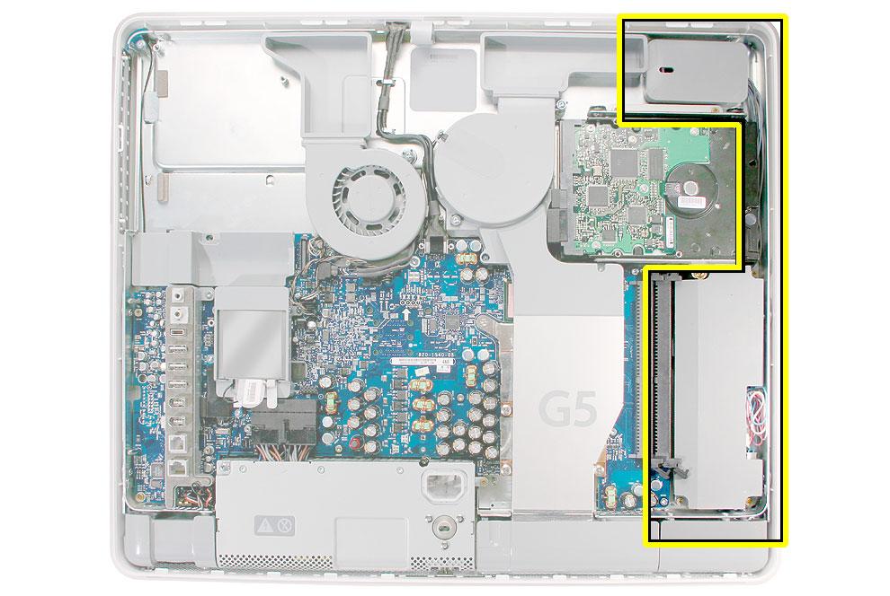 6. Locate the gray plastic module on the right side of the computer. This is the inverter. 7.